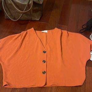 Sage the label. Short sleeve mid crop.